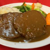 Meatloaf · Served with mashed potatoes, gravy & vegetables of the day.