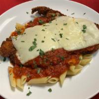 Chicken Parmesan · Hand-breaded chicken topped with our homemade marinara sauce & Mozzarella cheese served with...