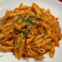 Penne Vodka · Penne pasta served in our homemade vodka sauce. Add Sautéed Chicken for an additional charge.