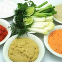 Assorted Mixed Spread · Hummus, baba ganoush, bojon, fried eggplant salad, spiced carrot salad, pickled red cabbage,...