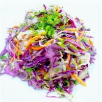 Vitamin Salad · Sliced cabbage, carrot, red and green pepper, dill, garlic tossed with vinegar and olive oil.