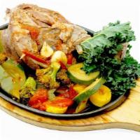Braised Lamb Chank With Mashed Potato · Lamb Shank are slowly simmered in Central Asian style. Served with Mashes potato and organic...