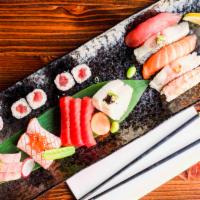 Sushi & Sashimi Entrée · 10 pieces assorted sashimi, 5 pieces assorted sushi and any 1 regular roll.