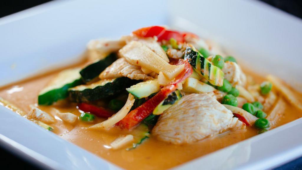 Red Curry Chicken · Bamboo shoots, basil, carrots, snow peas, bell peppers, simmered in coconut milk.