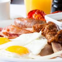 2 Egg, Meat, And Cheese Platter · Classic egg platter with eggs your way, melted cheese, your choice of meat and served with h...