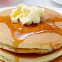 3 Buttermilk Pancakes · Perfectly made fluffy pancakes, served with a side of butter and syrup.