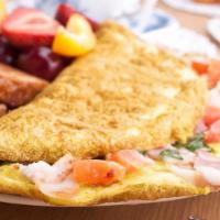 Meat Omelette Platter · Classic egg omelette with your choice of meat, served with home fries and toast.