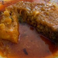 Curry Fish · Halal. Bangladeshi carp cooked in onion gravy, fine herbs, and spices.