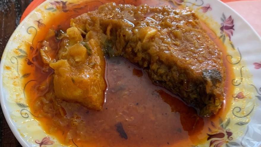 Curry Fish · Halal. Bangladeshi carp cooked in onion gravy, fine herbs, and spices.
