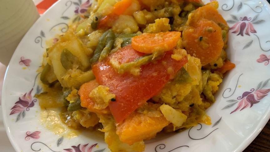 Mixed Vegetable · Mixed vegetable cooked in curry sauce.