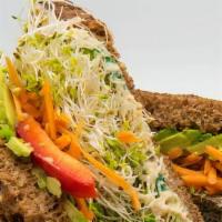 Humdinger · Hummus, avocado, shredded carrots, sprouts, cucumber, red pepper, toasted multigrain.