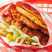 Double Spicy Fried Chicken Sandwich · 2 Hand Battered Spicy Fried Chicken Breast Cutlets on a Buttered Brioche Bun with Lettuce, P...