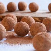 Chocolate Truffles · cacao powder, mesquite powder, coconut butter, maple syrup, cashew milk (cashew nuts, filter...
