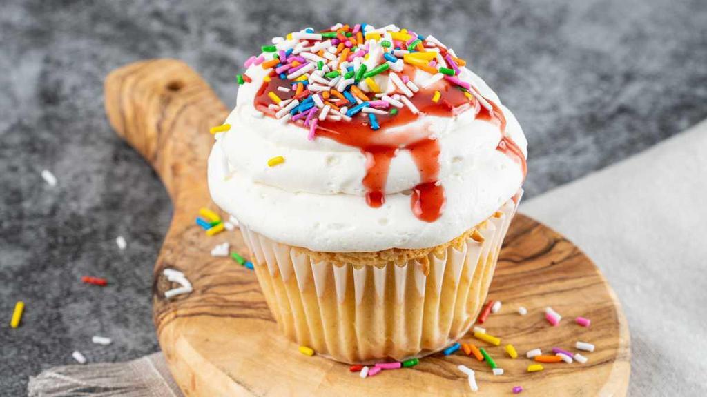 Strawberry Shortcake Cupcake · Vanilla Cake - Buttercream Frosting - Strawberry Filling - Sprinkles