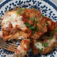 Chicken Parmesan · Lightly breaded boneless chicken breast with Pasta Vita's own marinara sauce, mozzarella and...