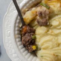 Frozen Shepherd'S Pie · Seasoned ground beef with onions, carrots, peas, corn and gravy with whipped potatoes.  

*L...