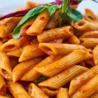 Pasta Alla Vodka · Your choice of pasta sautéed in our homemade vodka cream sauce. Served with our homemade bre...
