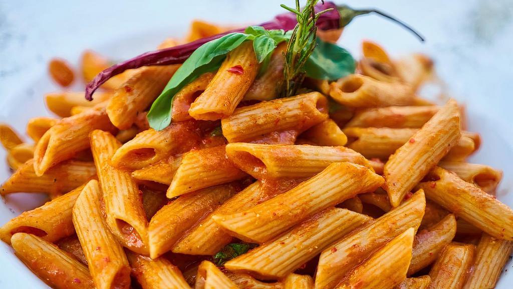 Pasta Pomodoro · Your choice of pasta served with plum tomato, basil, bacon, garlic, and olive oil. Served with our homemade bread on the side.