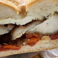American Sandwich · Roast beef, deluxe ham, ovengold turkey, American cheese, lettuce,  tomato, mayo.