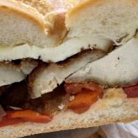New Yorker Sandwich · Hot pastrami, melted Swiss cheese, sauerkraut, Russian dressing.