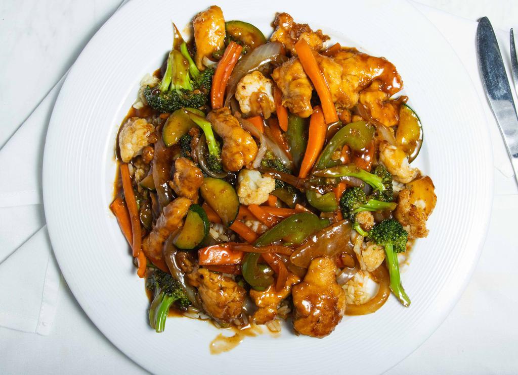 Chicken Szechuan · Stir fried Veggies with our szechuan sauce topped with sauteed chicken