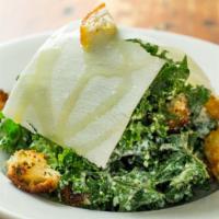 Cent'Anni Caesar Salad · Most popular. Black kale topped with anchovy-seasoned croutons and shaved parmigiano.