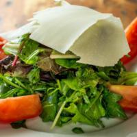 House Salad · Mixed greens, herbs and shaved parmigiano reggiano.