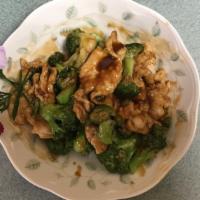 Chicken W. Broccoli · With white rice.