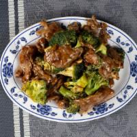 Beef W. Broccoli · With white rice.