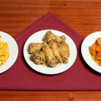 Naked Fried Wings Meal · Six wing dings with your choice of sauce and two sides.