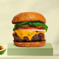 Heavy Target Burger · Angus beef patties, cheddar cheese, relish, red onion, tomato and hero sauce on a warm sesam...