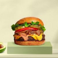 Hot Shot Veggie Burger · Veggie burger, portobello mushrooms, peppers, pickles, and lettuce on a warm multigrain bun.