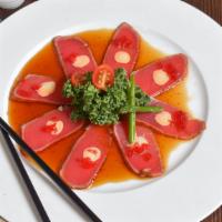 Pepper Tuna Tataki · Special pepper seared tuna served with spicy mayo, wasabi aioli, and ponzu sauce. Hot and sp...