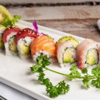 Rainbow Roll · Raw. Crab sticks and cucumber inside, topped with tuna, salmon, white fish, white tuna and a...