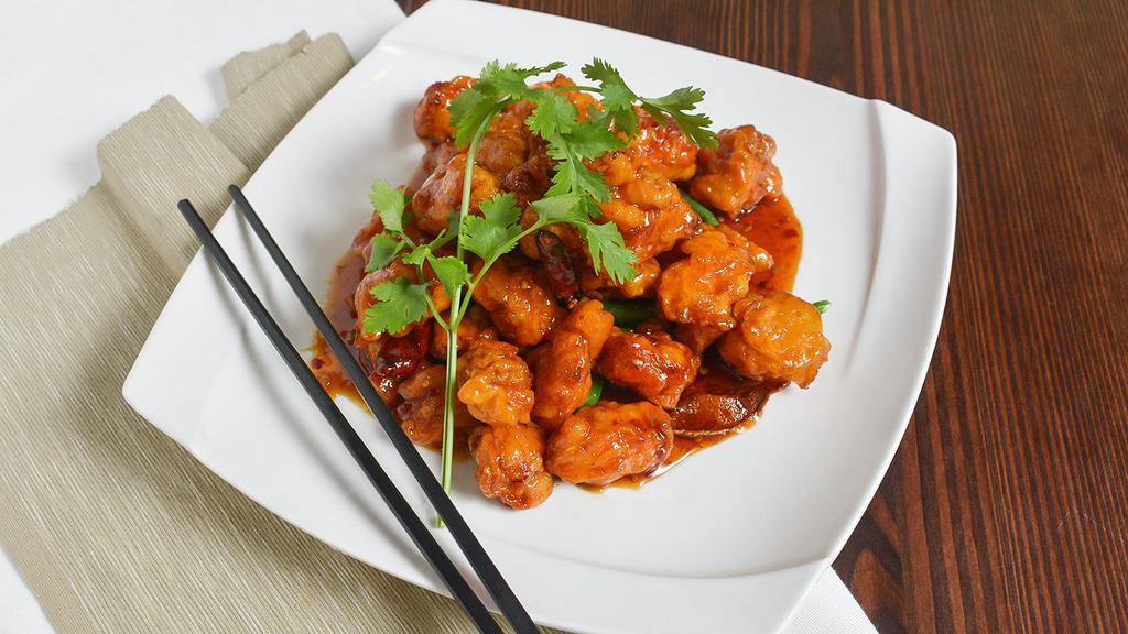 General Tso'S Chicken · Hot. Wok tossed in caramel glazed mild spicy peppercorn sauce with breaded white meat.