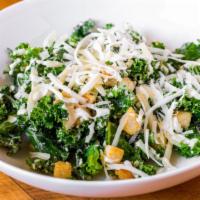Insalata Di Cesare · Tuscan Kale, Homemade Croutons, Shaved Parmigiano, Cesar Dressing