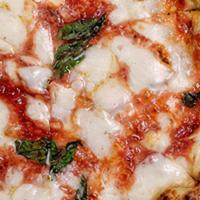 Montanara · Traditional Neapolitan Deep Fried Pizza, Fresh Basil, Mozzarella, Tomato Sauce
