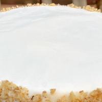 Carrot Cake Slice · Gluten free carrot cake! Three layers of carrot cake baked with fresh chopped carrots, pinea...