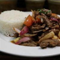 Saltado · Choice of protein, sautéed onions, tomatoes, soy sauce, fries and white rice.