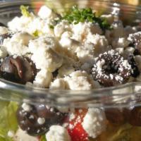 Greek Salad · Romaine lettuce, cucumber, cherry tomato, red onion, black olives and feta cheese served wit...