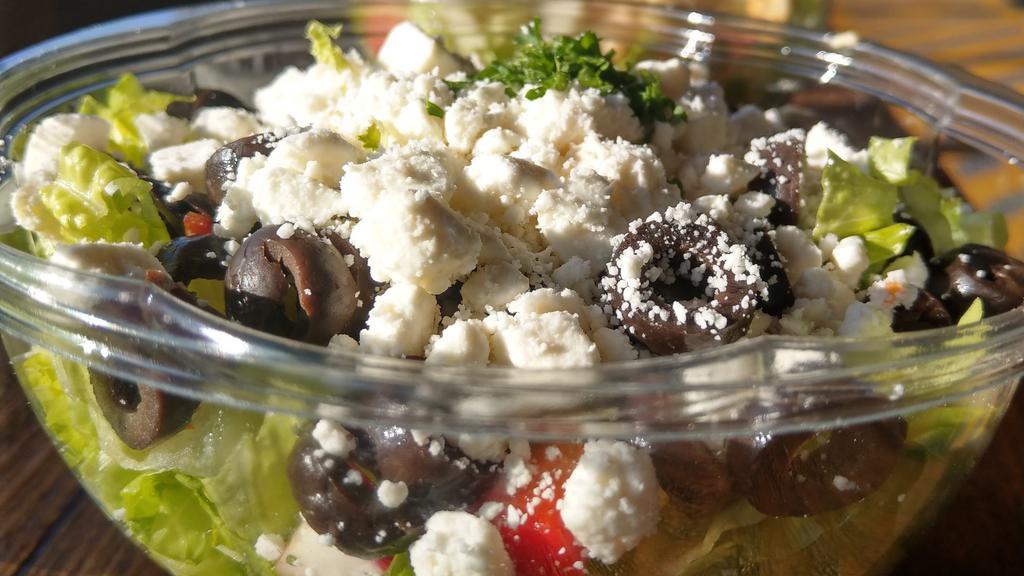 Greek Salad · Romaine lettuce, cucumber, cherry tomato, red onion, black olives and feta cheese served with side of balsamic vinaigrette.