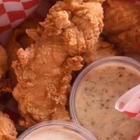 Buttermilk Chicken Tenders · Alabama White BBQ Sauce, Honey Mustard