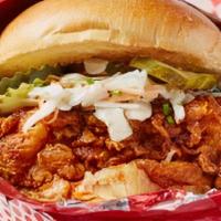Nashville Hot Chicken · Nashville Hot n Spicy Glaze, Pickles, Coleslaw, Buttered Brioche Bun