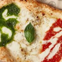 Pizza Tre Gusti  · A trio of our best seller's combined into one oval shaped pizza:margherita, cacio e pepe, pe...