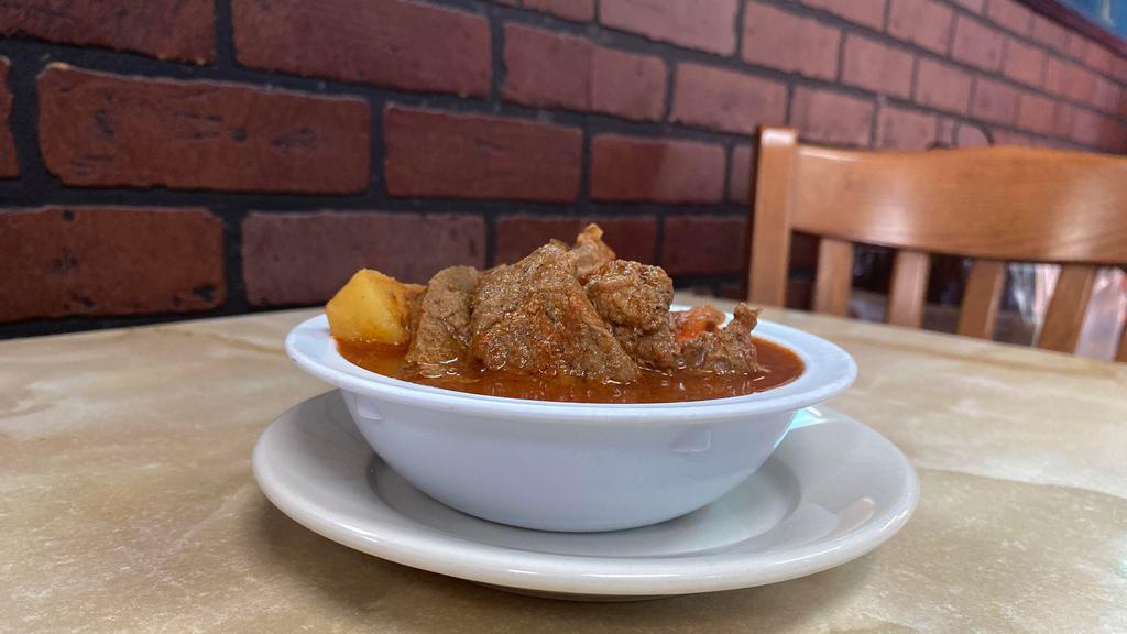 Carne Guisada · Served with rice and beans. Lunch specials everything separate.