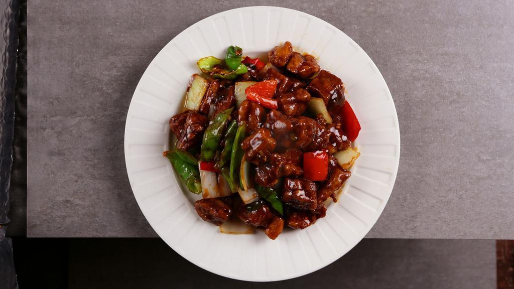 Zouji Ribs With Braised In Brown Sauce · Spare ribs, peppers, onions.