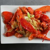 Ginger & Scallion Lobster · Wok-fried cut up a lobster with vegetable in ginger and scallion brown sauce.