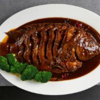 Zouji Braised Fish · Braised whole fish with bone with homemade brown sauce.