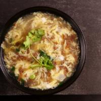 Xi Hu Beef Soup · Beef, egg drop, scallion, cilantro.