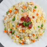 Yang Chow Fired Rice · Shrimp, sausage, carrots, peas, egg.